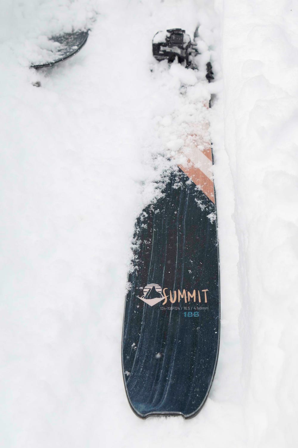 close-up image of the tail of a weston summit ski in the snow